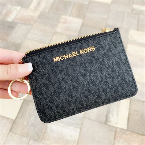 michael kors black change purse|Michael Kors guarantee on purses.